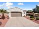 One-story home featuring a low maintenance yard and neutral exterior architecture at 12860 W Junipero Dr, Sun City West, AZ 85375
