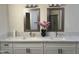 Bathroom featuring double vanity, marble countertops and attractive decor at 1444 W Spruce Dr, Chandler, AZ 85286