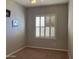 Cozy bedroom with plantation shutters providing ample natural light and privacy at 1444 W Spruce Dr, Chandler, AZ 85286