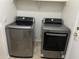 Laundry room featuring modern stainless steel appliances at 1444 W Spruce Dr, Chandler, AZ 85286