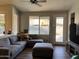 Cozy living room area with comfortable seating and natural light at 1444 W Spruce Dr, Chandler, AZ 85286