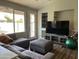 Cozy living room area with comfortable seating and entertainment center at 1444 W Spruce Dr, Chandler, AZ 85286