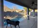 Covered patio area overlooking the pool and landscaped backyard at 1444 W Spruce Dr, Chandler, AZ 85286