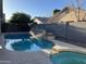 Backyard pool and spa with water feature in a private backyard at 1444 W Spruce Dr, Chandler, AZ 85286