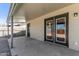 Covered patio with view of backyard, shed, and fenced perimeter at 1646 W Fairmont Dr, Tempe, AZ 85282