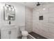 Updated bathroom with modern vanity, walk-in shower and sleek fixtures at 1646 W Fairmont Dr, Tempe, AZ 85282