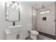 Stylish bathroom featuring a modern vanity and a walk-in shower at 1646 W Fairmont Dr, Tempe, AZ 85282