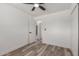 Spacious bedroom featuring neutral walls, wood-look flooring, and ample natural light at 1646 W Fairmont Dr, Tempe, AZ 85282