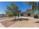 Quaint one-story home featuring well-maintained desert landscaping, a rock lawn, and a charming front yard at 1646 W Fairmont Dr, Tempe, AZ 85282