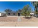 Charming single-story home with desert landscaping, rock cover, and a well-maintained front yard at 1646 W Fairmont Dr, Tempe, AZ 85282