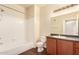 Clean bathroom featuring a vanity with wood cabinets and a shower-tub combination at 1941 S Pierpont Dr # 2141, Mesa, AZ 85206