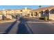 Gated community entrance with well-maintained landscaping and multiple residential buildings at 1941 S Pierpont Dr # 2141, Mesa, AZ 85206