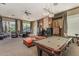 Spacious game room with a billiard table, comfortable seating and stylish decor at 1941 S Pierpont Dr # 2141, Mesa, AZ 85206