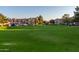 Expansive community lawn with residential buildings in the background at 1941 S Pierpont Dr # 2141, Mesa, AZ 85206