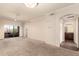 Spacious living room with a ceiling fan and access to a balcony overlooking the complex at 1941 S Pierpont Dr # 2141, Mesa, AZ 85206