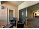 Comfortable covered patio with seating area, providing seamless indoor-outdoor flow at 1941 S Pierpont Dr # 2141, Mesa, AZ 85206