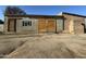 Rustic barn featuring wooden doors and brick accents at 206 S 5Th St, Buckeye, AZ 85326