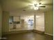 Open floor plan showcasing the kitchen's white cabinets and access to outdoor area at 2215 W Highland Ave, Phoenix, AZ 85015