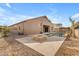 This backyard boasts a pool, fire pit, and travertine tile, perfect for outdoor relaxation and entertainment at 22186 E Via Del Verde --, Queen Creek, AZ 85142
