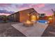 This home offers a backyard fire pit and a pool at 22186 E Via Del Verde --, Queen Creek, AZ 85142