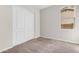 Neutral bedroom with carpet, closet, window and base trim at 22186 E Via Del Verde --, Queen Creek, AZ 85142