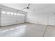 Garage with epoxy flooring and a white garage door at 22186 E Via Del Verde --, Queen Creek, AZ 85142