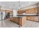 Spacious kitchen with a large island, stainless steel appliances, and ample cabinet space at 22186 E Via Del Verde --, Queen Creek, AZ 85142