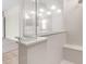 A frameless glass shower featuring a built in seat at 22186 E Via Del Verde --, Queen Creek, AZ 85142