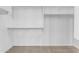 A simple walk-in closet with carpeted floor and shelving at 22186 E Via Del Verde --, Queen Creek, AZ 85142