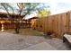 Enclosed backyard with pavers and landscaped perimeter at 2221 W Farmdale Ave # 7, Mesa, AZ 85202