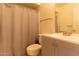 Bathroom with shower curtain, sink and vanity at 2221 W Farmdale Ave # 7, Mesa, AZ 85202