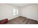 Empty carpeted bedroom provides a blank canvas to create a personalized space at 24113 N 26Th Pl, Phoenix, AZ 85024