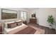 Cozy bedroom features a large window, a comfortable bed, and carpeted floors at 24113 N 26Th Pl, Phoenix, AZ 85024
