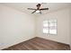 Bright bedroom featuring a ceiling fan, carpet flooring and a window at 24113 N 26Th Pl, Phoenix, AZ 85024