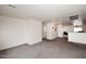 Large carpeted bonus room offers flexible space for recreation or home office at 24113 N 26Th Pl, Phoenix, AZ 85024