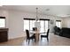 Dining nook with a view of the backyard, kitchen, and living room at 24113 N 26Th Pl, Phoenix, AZ 85024