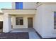 Inviting front entrance with a covered porch and decorative stone accents at 24113 N 26Th Pl, Phoenix, AZ 85024