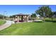 A park with a picnic shelter, playground equipment, and green grass, perfect for outdoor Gathering activities at 24113 N 26Th Pl, Phoenix, AZ 85024