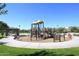 A colorful playground with various play structures and seating areas in a community park at 24113 N 26Th Pl, Phoenix, AZ 85024