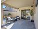 Covered patio with outdoor seating overlooking the pool and backyard at 2414 W White Feather Ln, Phoenix, AZ 85085