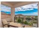 Scenic balcony with comfortable seating and expansive views of the desert landscape and mountains at 24350 N Whispering Ridge Way # 22, Scottsdale, AZ 85255