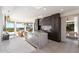 Well-lit kitchen featuring an oversized island and sleek, modern cabinetry at 24350 N Whispering Ridge Way # 22, Scottsdale, AZ 85255