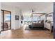 Spacious main bedroom featuring a four-poster bed, fireplace, and scenic views at 24350 N Whispering Ridge Way # 22, Scottsdale, AZ 85255