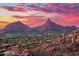 Scenic mountain view homes under a colorful sunset sky at 24350 N Whispering Ridge Way # 22, Scottsdale, AZ 85255