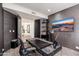 Stylish office showcases a unique desk, built-in shelving, and elegant decor for a productive workspace at 24350 N Whispering Ridge Way # 22, Scottsdale, AZ 85255
