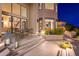 Outdoor patio with comfortable seating, beautiful desert landscaping, and seamless indoor-outdoor living at 24350 N Whispering Ridge Way # 22, Scottsdale, AZ 85255
