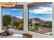 Window view capturing mountains and neighborhood from dining space at 24350 N Whispering Ridge Way # 22, Scottsdale, AZ 85255