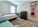 Cozy bedroom featuring neutral walls, carpeted floors, and comfortable furnishings at 24552 W Hilton Ave, Buckeye, AZ 85326