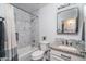Updated bathroom featuring stylish tile shower, granite counter tops and updated vanity at 2889 S 161St Dr, Goodyear, AZ 85338