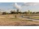 Neighborhood park has walking path and mature shade trees at 3147 W Phelps Rd, Phoenix, AZ 85053